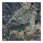 Barrydale aerial map print showing the town on Route 62 from above, with the green river line and farm dams against dry Karoo hills and contoured slopes.