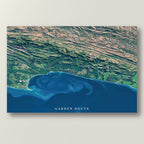 Garden Route 2 East satellite print in the Titled style, showing the coast from the Robberg Peninsula to the Tsitsikamma Mountains, with deep blue water and ocean currents, and the title Garden Route on the image