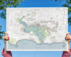 Knysna large map print in the Classic style, held up in two hands, showing the lagoon, the Heads and the town
