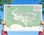Knysna large map print in the Contemporary style, held up in two hands, showing the lagoon, the Heads and the road network