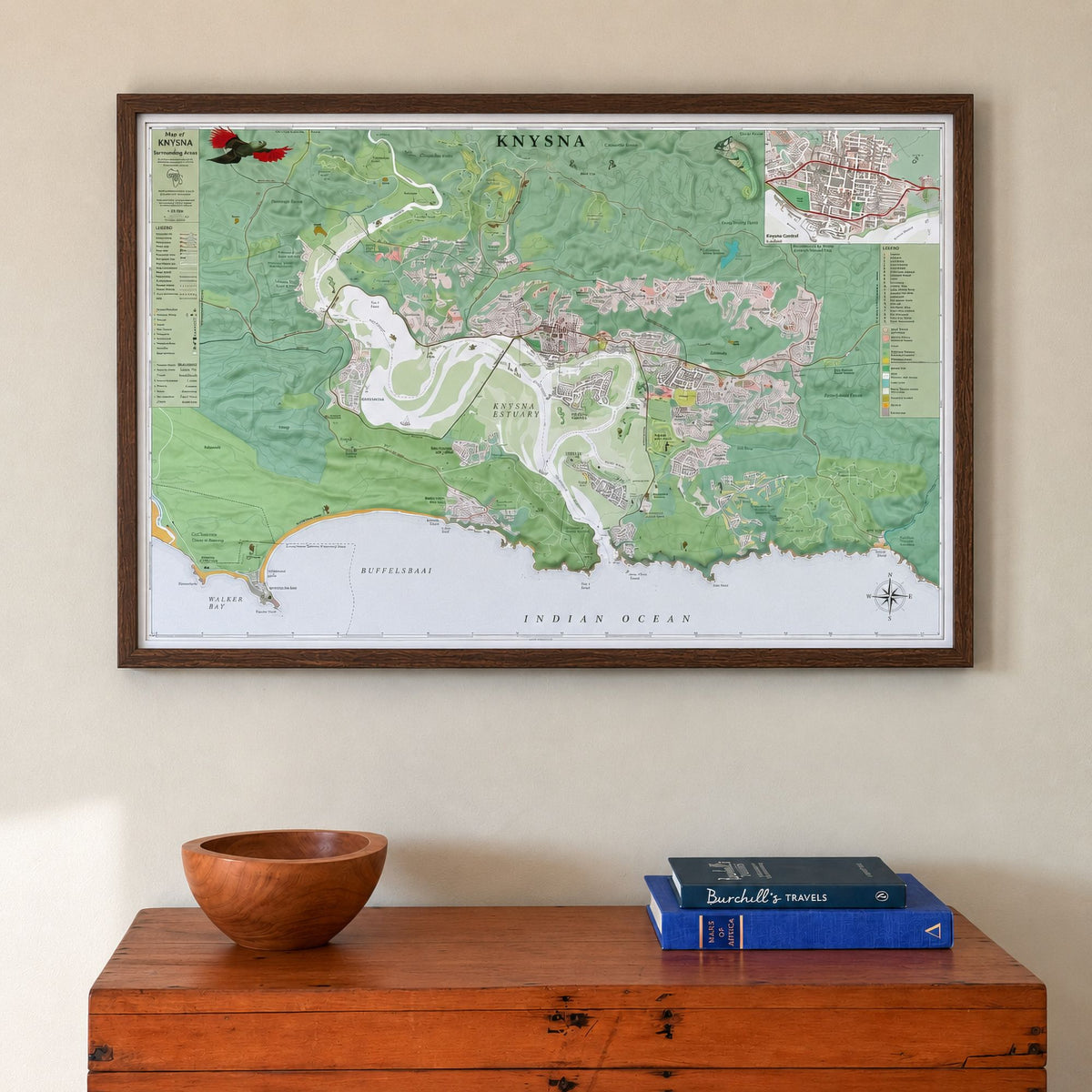 Knysna large map print in the Contemporary style, in a dark wood frame, hung above a wooden chest