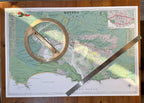 Knysna large map print in the Contemporary style, photographed flat on a wooden table with a brass protractor and steel rule
