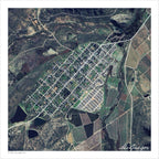 McGregor aerial map print showing the town's diagonal street grid from above, with green vineyards and orchards to the south and dark farm dams on the western edge