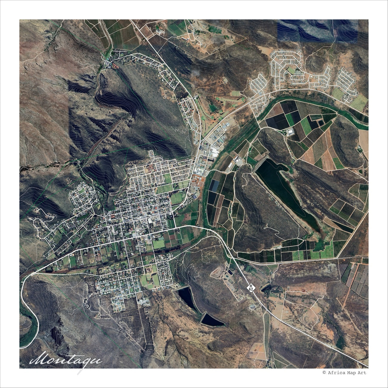 Montagu aerial map print showing the town's grid from above, with green irrigated vineyards, a dark dam and the folded ridges of the surrounding mountains