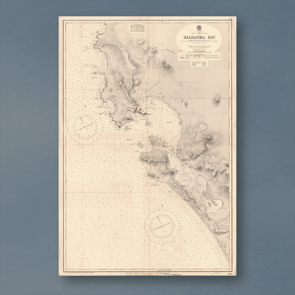 1934 Admiralty chart of Saldanha Bay, reproduction print showing the bay, its islands and the entrance channel, with depth soundings and two compass roses