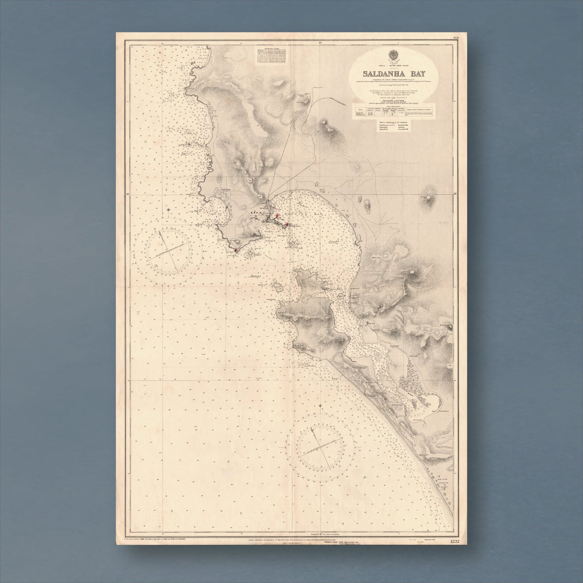 1934 Admiralty chart of Saldanha Bay, reproduction print showing the bay, its islands and the entrance channel, with depth soundings and two compass roses