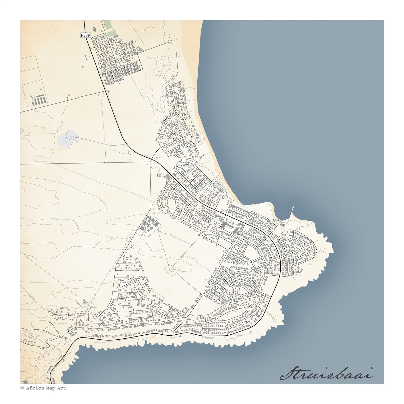 Struisbaai map print in the Classic style, with fine black street lines, grey buildings, blue sea along the coastline and contoured slopes on a cream background.
