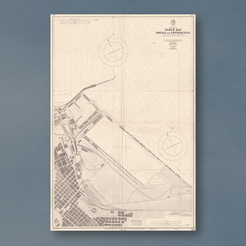 1943 Admiralty chart of the Table Bay Docks, reproduction print showing Cape Town's harbour basins, breakwater and city street grid, with two compass roses